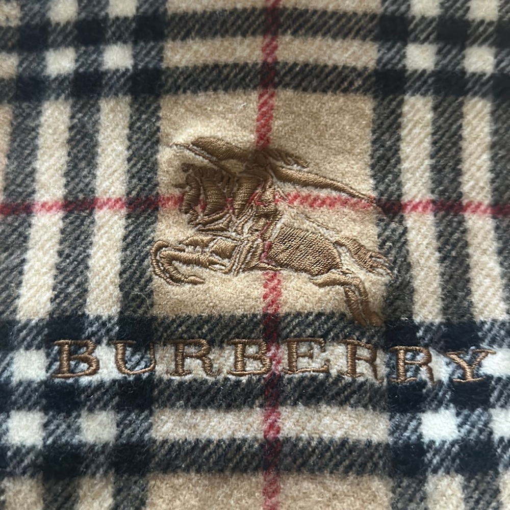 Burberry scarf 24.75X45 good condition